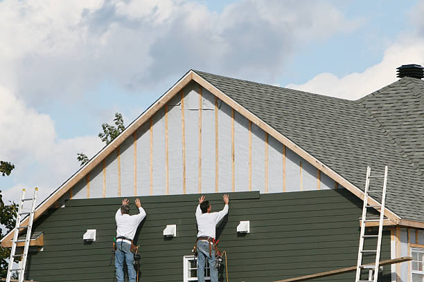 Professional Siding technician working in Carrollton, GA